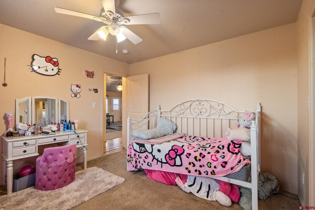 bedroom featuring a ceiling fan and carpet floors