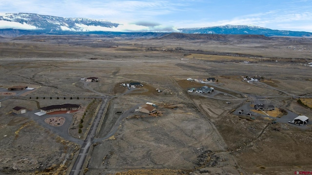 bird's eye view with a mountain view