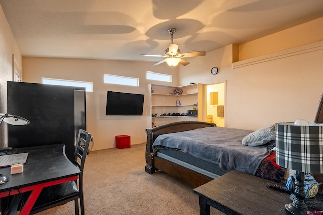 bedroom with carpet flooring, ceiling fan, and lofted ceiling