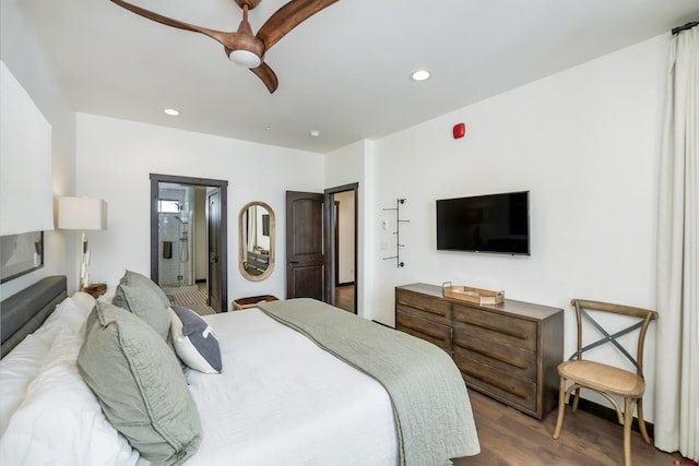 bedroom featuring a ceiling fan, recessed lighting, wood finished floors, and ensuite bathroom