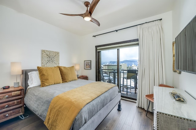 bedroom with a ceiling fan, access to outside, and wood finished floors