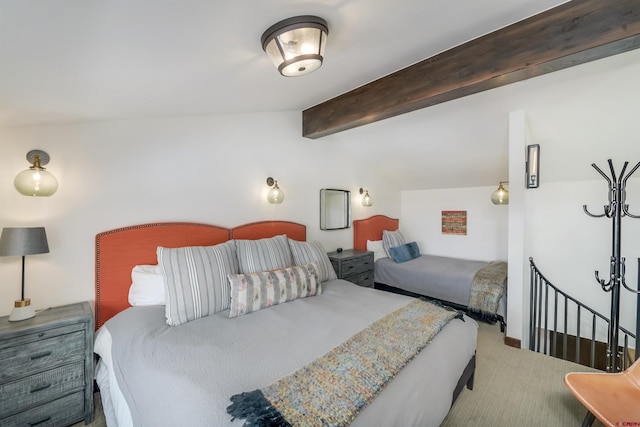 bedroom featuring lofted ceiling with beams and carpet floors