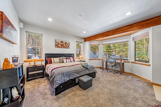 bedroom with recessed lighting, carpet, baseboards, and a textured ceiling