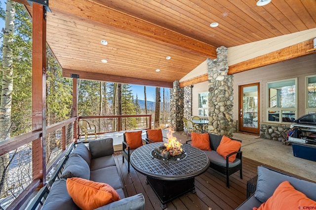 sunroom / solarium featuring wood ceiling and lofted ceiling with beams