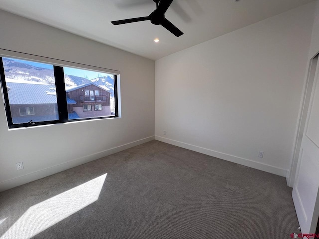 unfurnished room featuring recessed lighting, carpet flooring, a ceiling fan, and baseboards