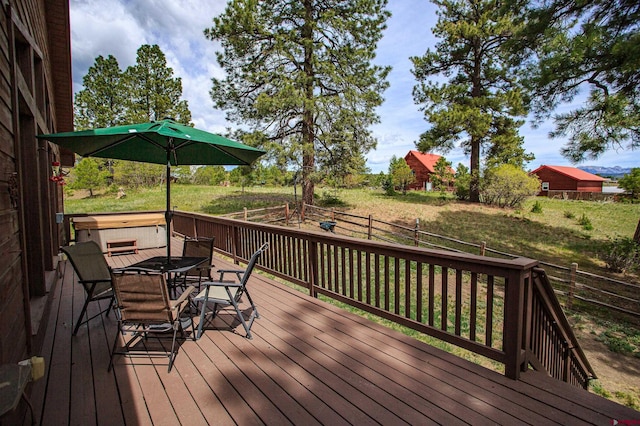 deck with outdoor dining space