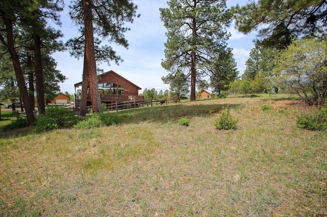 view of yard featuring a deck