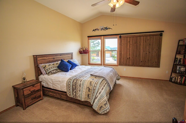 bedroom featuring ceiling fan, baseboards, lofted ceiling, and carpet floors