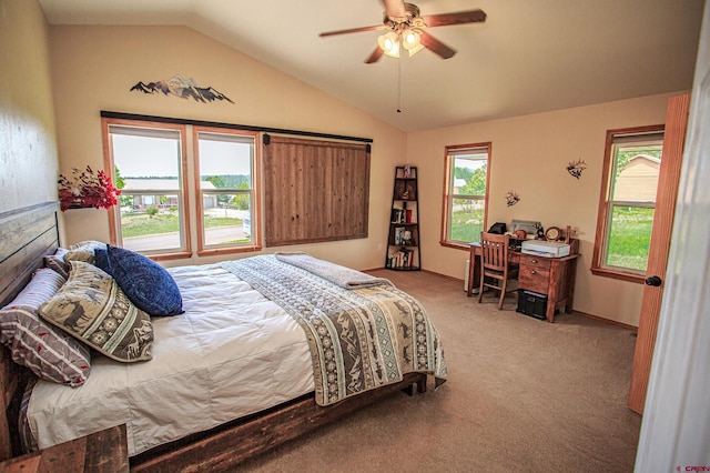 bedroom featuring light carpet, multiple windows, a ceiling fan, and vaulted ceiling