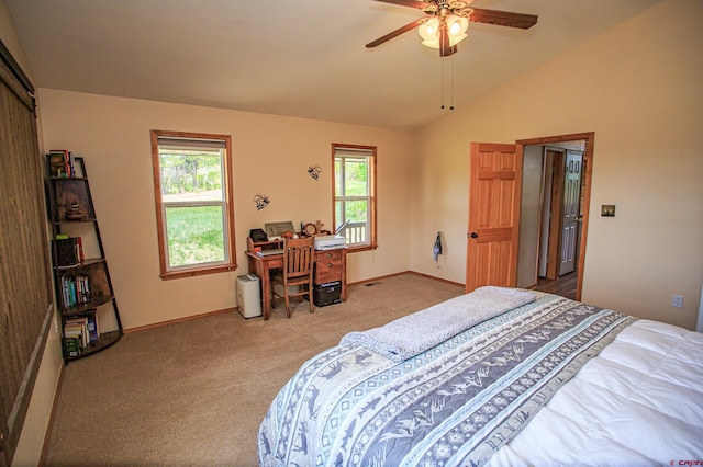 carpeted bedroom with baseboards, multiple windows, lofted ceiling, and ceiling fan