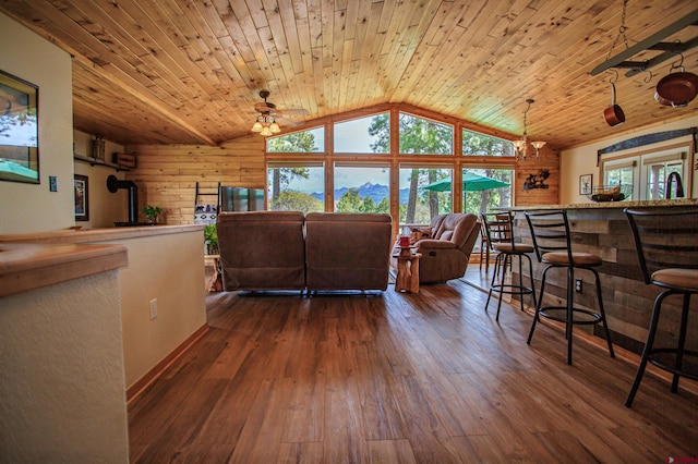 living area featuring wooden ceiling, a dry bar, dark wood-type flooring, and vaulted ceiling