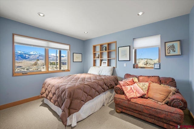 carpeted bedroom with recessed lighting and baseboards