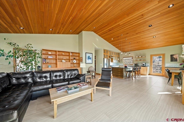 living area featuring recessed lighting, wooden ceiling, and high vaulted ceiling