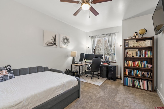 bedroom featuring ceiling fan, baseboards, and carpet floors