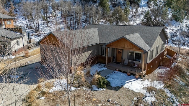 view of front of home featuring a shingled roof