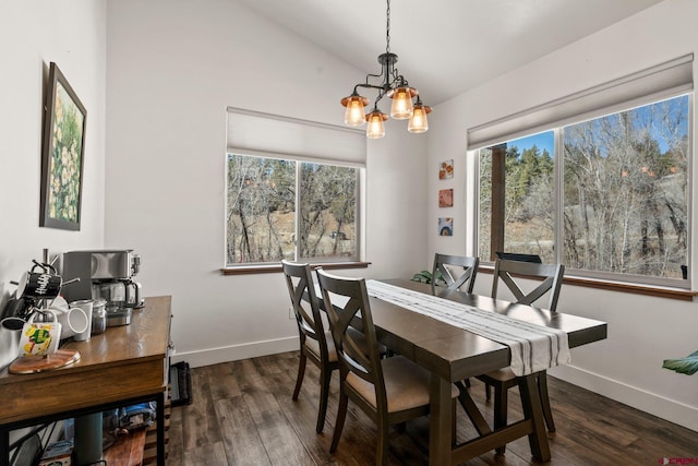 dining space featuring baseboards, dark wood-type flooring, and lofted ceiling