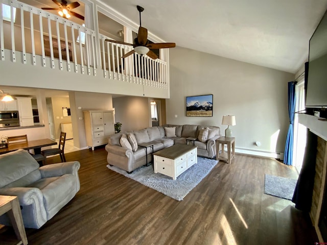 living room featuring dark wood-type flooring, a fireplace, and ceiling fan