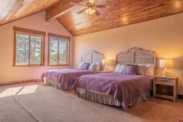 carpeted bedroom featuring lofted ceiling with beams, wood ceiling, and ceiling fan