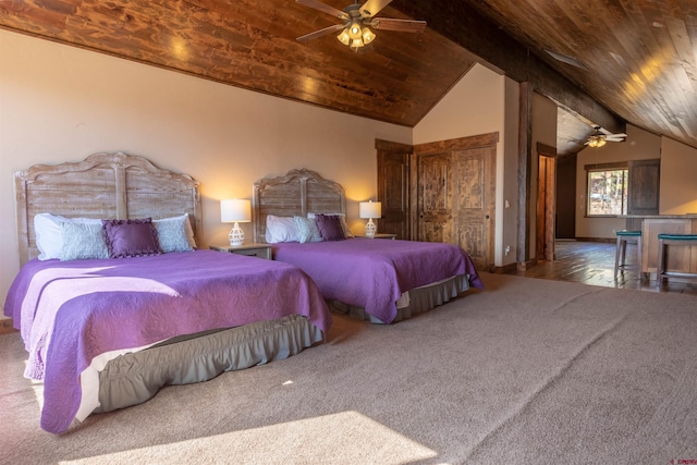 bedroom with lofted ceiling with beams, wooden ceiling, carpet flooring, and ceiling fan