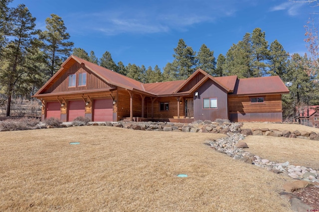 cabin with an attached garage