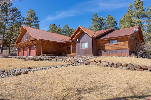 rustic home featuring metal roof