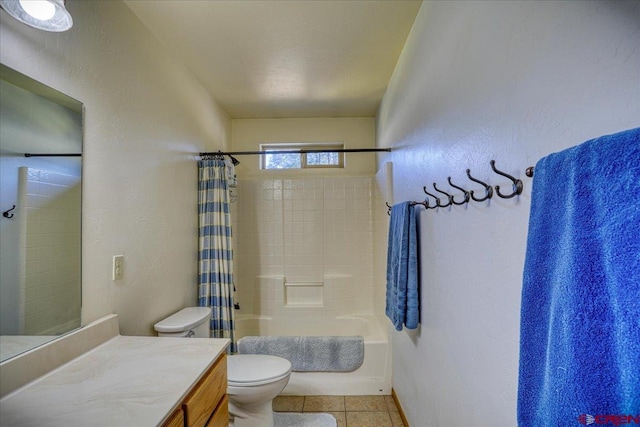 bathroom with toilet, shower / tub combo with curtain, tile patterned flooring, vanity, and a textured wall