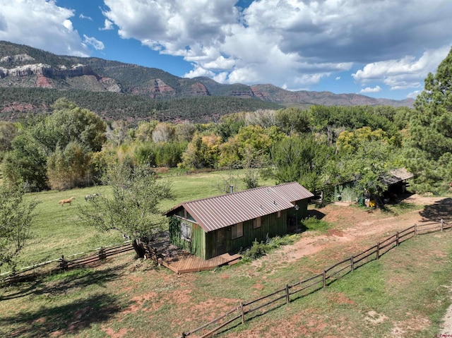 mountain view with a rural view and a wooded view