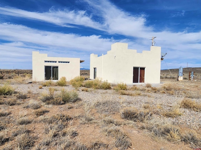 exterior space with stucco siding