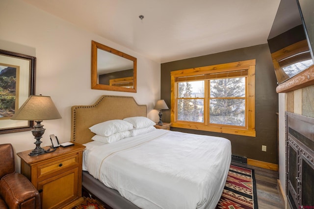 bedroom featuring wood finished floors