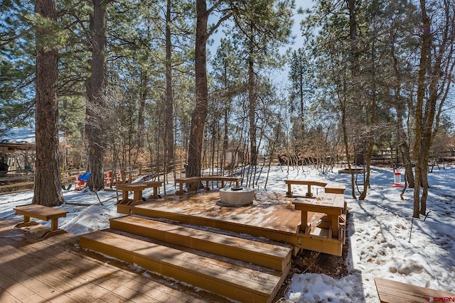 view of snow covered deck