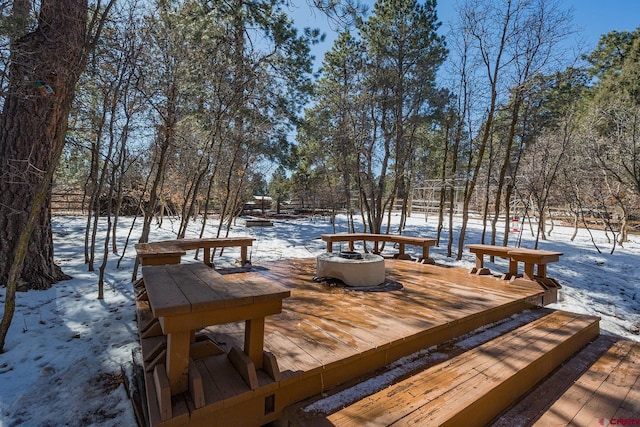 view of snow covered deck