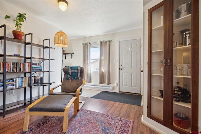 sitting room with wood finished floors