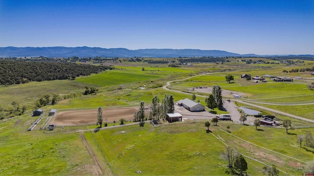 bird's eye view with a rural view and a mountain view