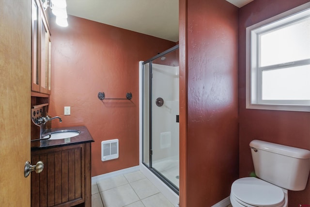 bathroom featuring tile patterned floors, visible vents, toilet, a shower stall, and vanity