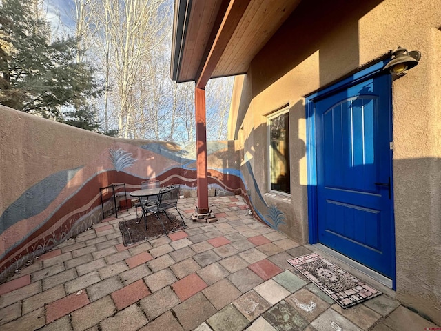 view of patio featuring outdoor dining area