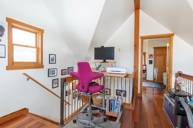 office space featuring baseboards, lofted ceiling, and wood finished floors