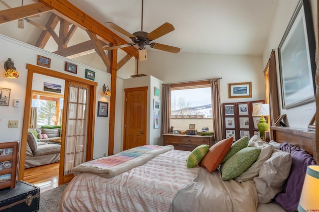 bedroom with french doors, a ceiling fan, and vaulted ceiling