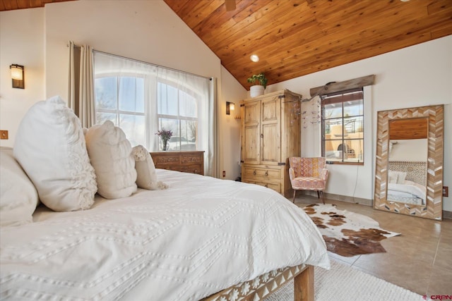 bedroom with vaulted ceiling, wood ceiling, and baseboards