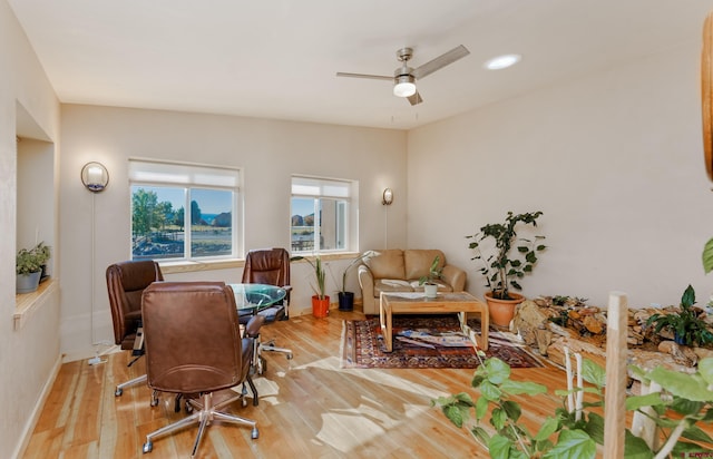 office featuring recessed lighting, baseboards, wood finished floors, and a ceiling fan