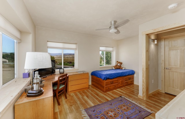 bedroom with light wood-style flooring