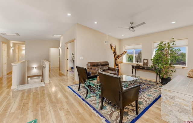 living room featuring recessed lighting, baseboards, light wood-style flooring, and ceiling fan