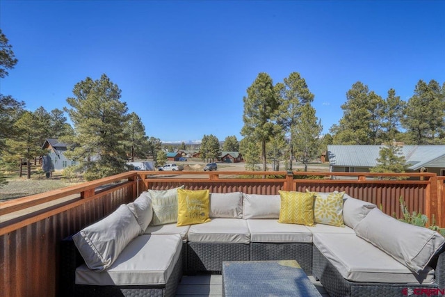 deck featuring outdoor lounge area