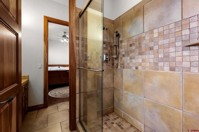 full bath featuring ceiling fan and a stall shower