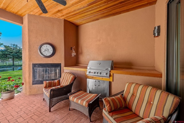 view of patio featuring a grill