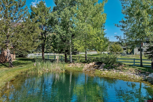 view of water feature featuring fence