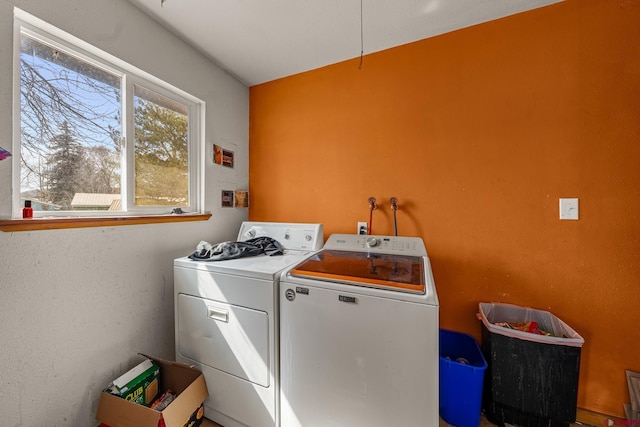 washroom featuring laundry area and independent washer and dryer