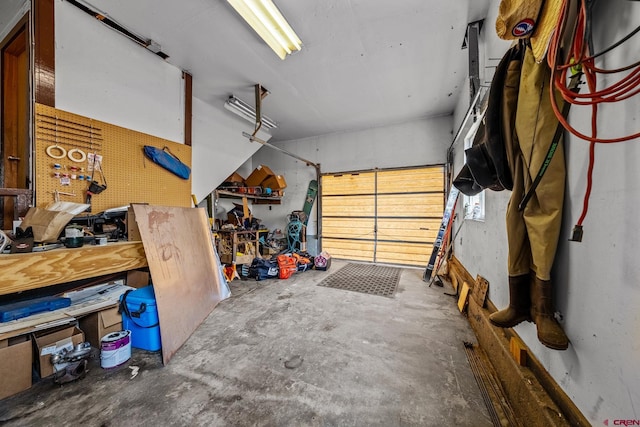 garage with a workshop area