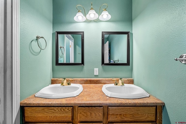 bathroom featuring double vanity and a sink