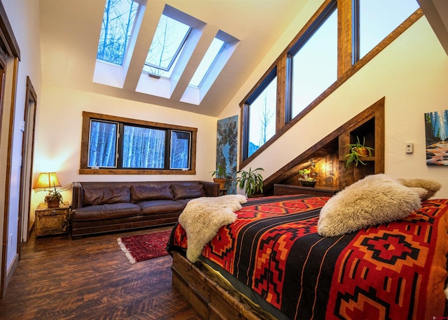 214 Mill Rd, Rico, CO 81332 - bedroom with high vaulted ceiling, a skylight, and wood finished floors