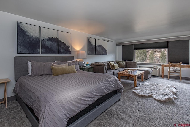 carpeted bedroom with baseboards